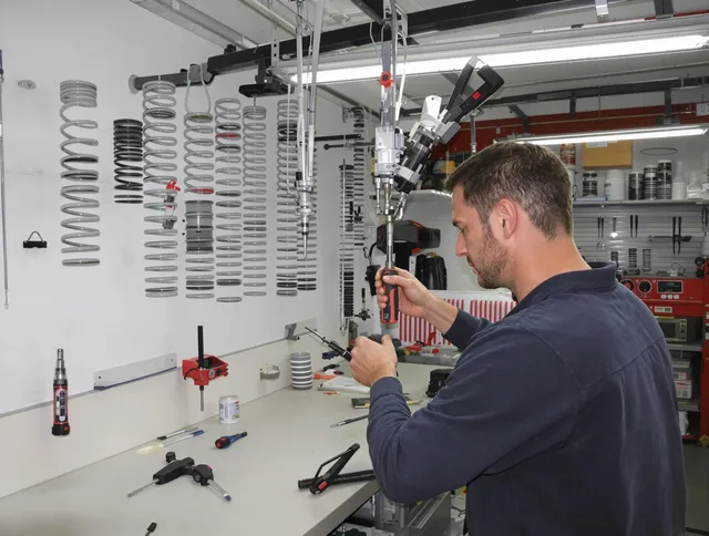Winchester Garage Door Repair safety certified technician performing precision spring replacement in Winchester