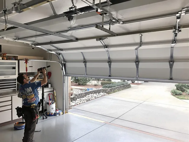 Garage door track repair service by Winchester Garage Door Repair in Winchester